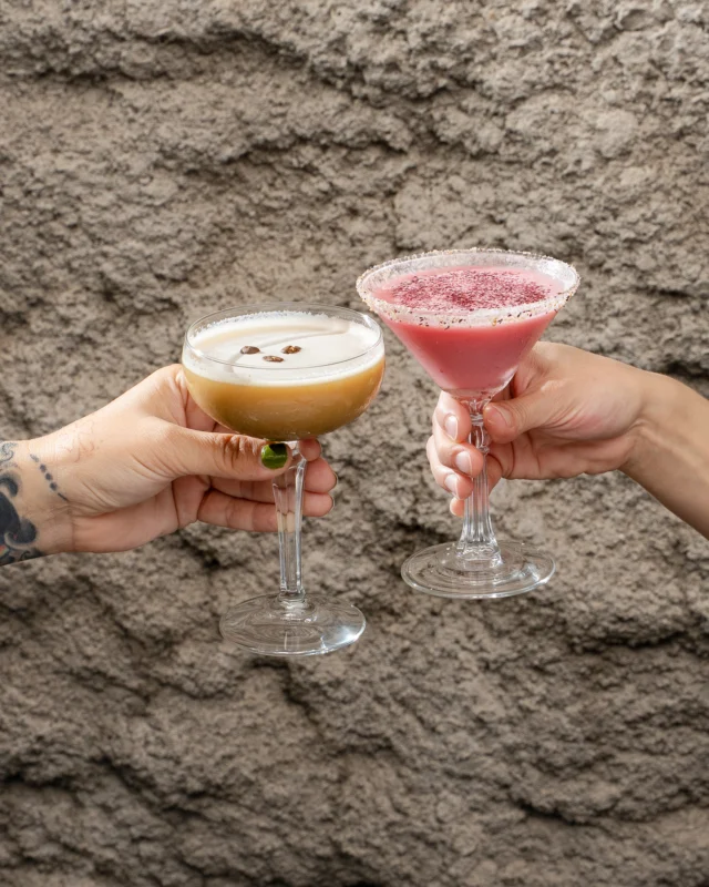 Summer sips, two ways. ☀️

☕ Nutty Noir brings vodka, pistachio cream, cold brew, and a whisper of orange-vanilla-cardamom. 
🏝 Pink Mirage keeps it zero-proof with hibiscus coconut cream, watermelon, lime, and Giffard NA pineapple. Refreshing, dreamy, and ready for your next toast.
.
.
.
.
.
.
.
.
📸: @savery.media