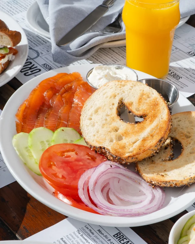 Nothing beats a classic. The Lox Plate with cream cheese, tomato, cucumber, onion, and capers on a Grossman’s Bakery bagel. 
📸: @savery.media