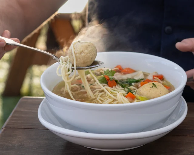 Cold days, meet your match.
The Big Piece of Chicken
Matzoh ball, ramen noodles, kreplach, pulled chicken.