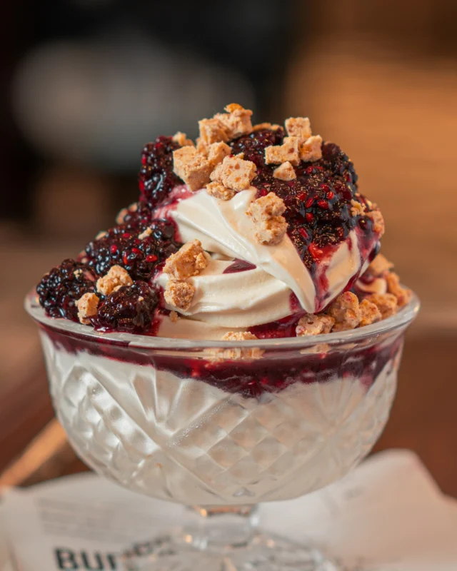 Sweet, cold, crunchy, jammy.
Straus Organic Soft Serve with blackberries and white chocolate crumble hits every note.